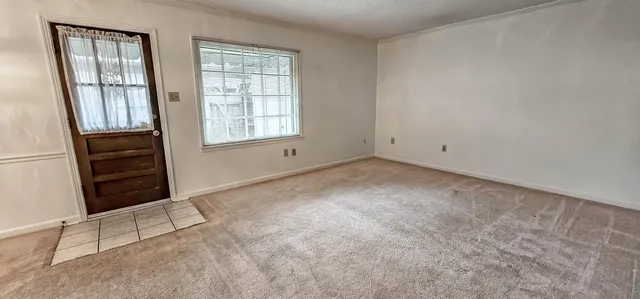 an empty room with windows