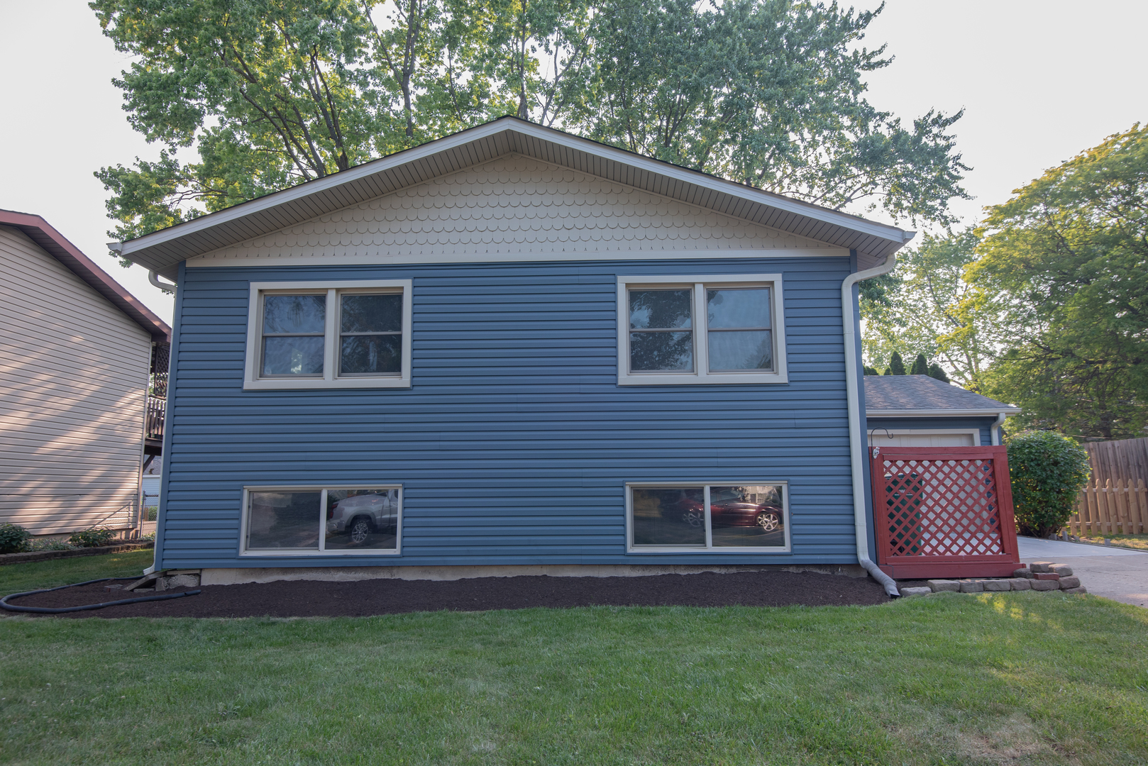 a brick house with a yard