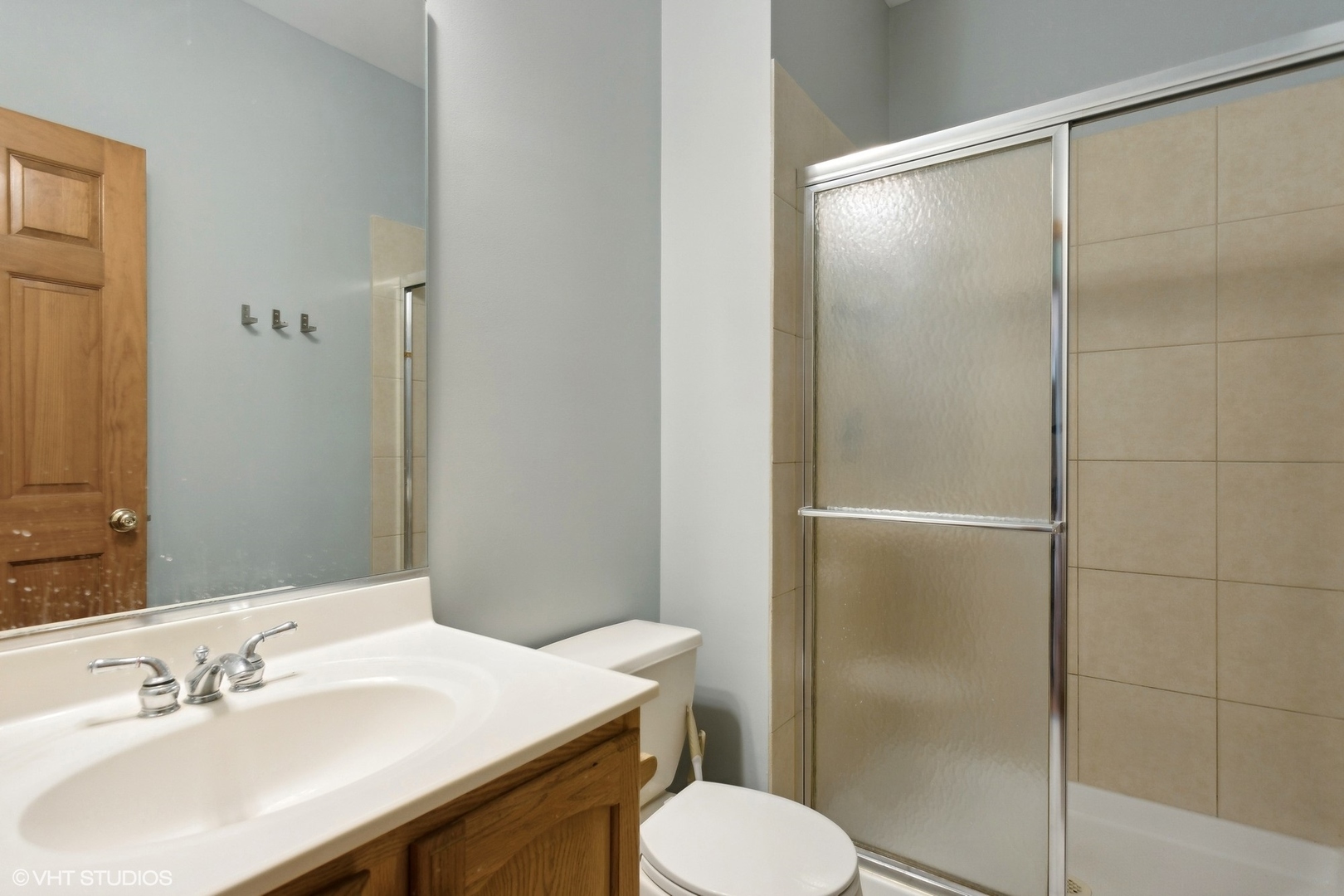 2908 Beth Lane Naperville, IL 60564 - Photo 18 of 22 a bathroom with a sink toilet and shower