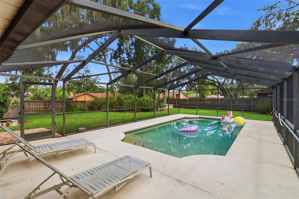 302 Bloomingfield Drive Brandon, FL 33511 - Photo 45 of 58 a view of a backyard with sitting area