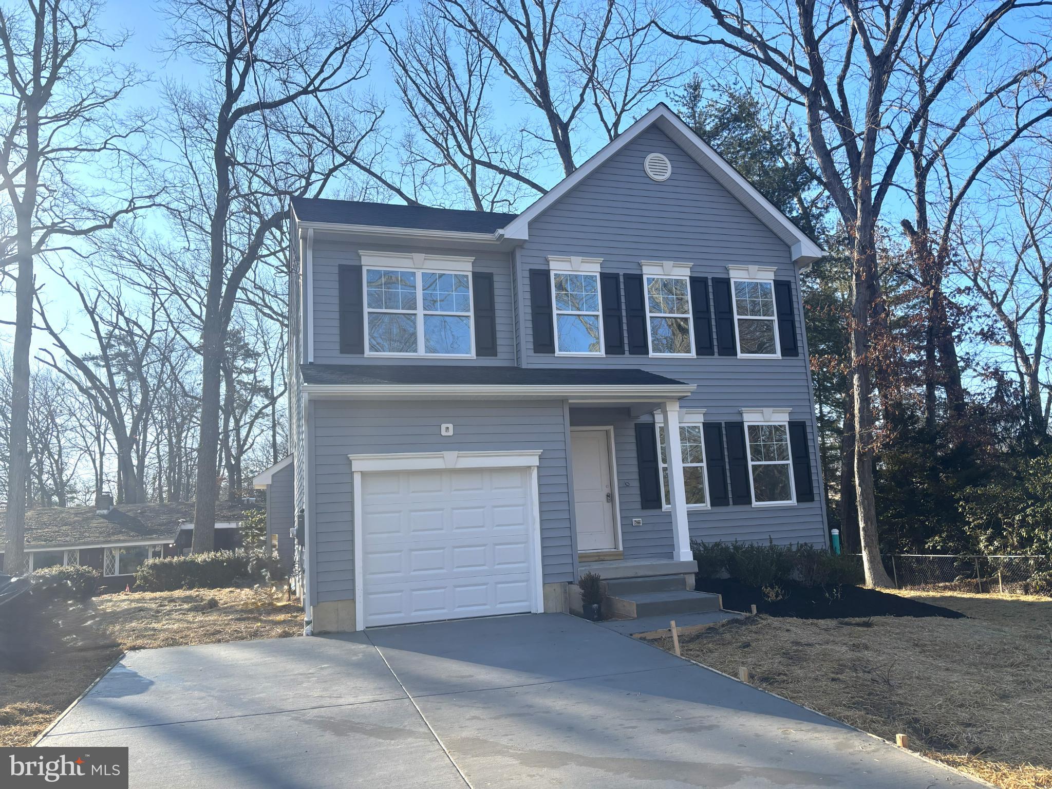 5 Harding Avenue Clementon, NJ 08021 - Photo 2 of 7 a front view of a house with a yard and garage