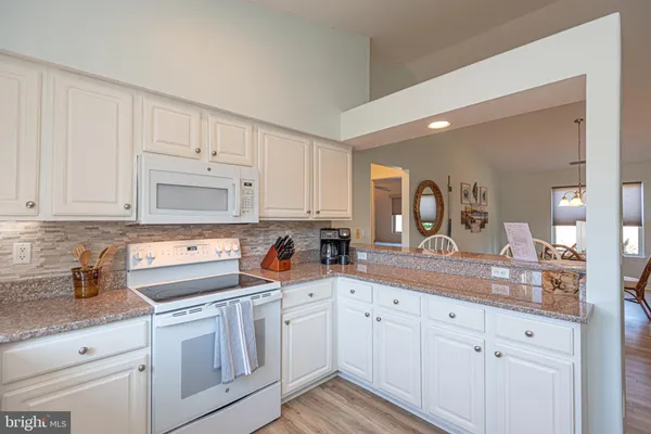 a bedroom with a bed and a cabinets