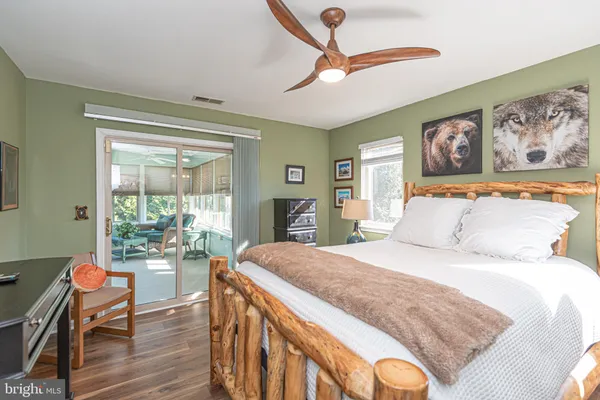 a view of a bedroom from a hallway