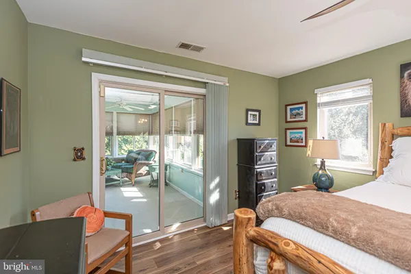 an aerial view of a house with a yard lake view