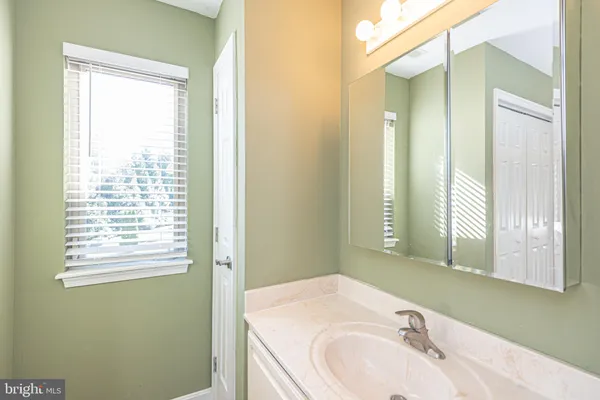 an aerial view of a house with a yard sitting space