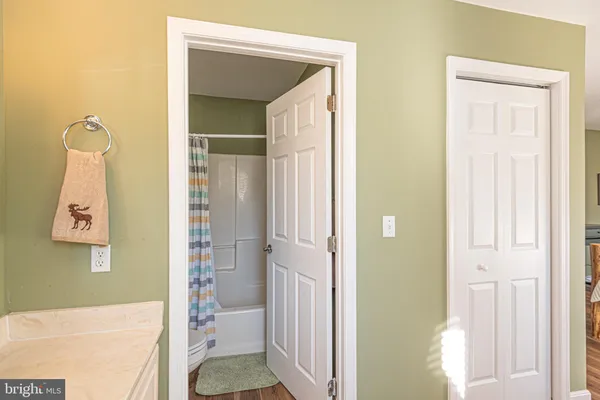 an aerial view of multiple houses with yard