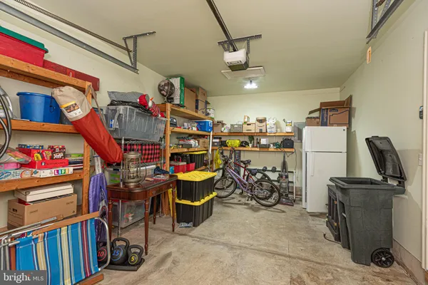 a view of staircase with white walls