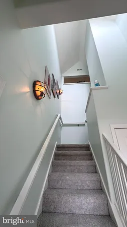 a room that has a window in it and a wooden floor