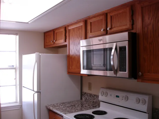 a kitchen that has a sink and a window