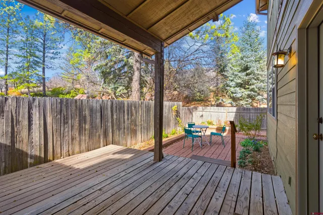 a view of a pathway with a backyard
