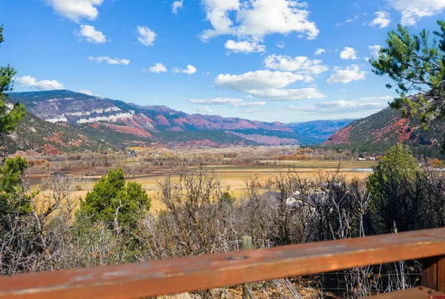 a view of a terrace with sunset view