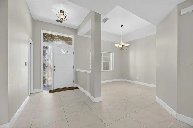 a kitchen with stainless steel appliances granite countertop a stove and a refrigerator