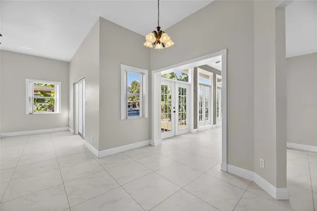 a view of a lake with a wooden deck