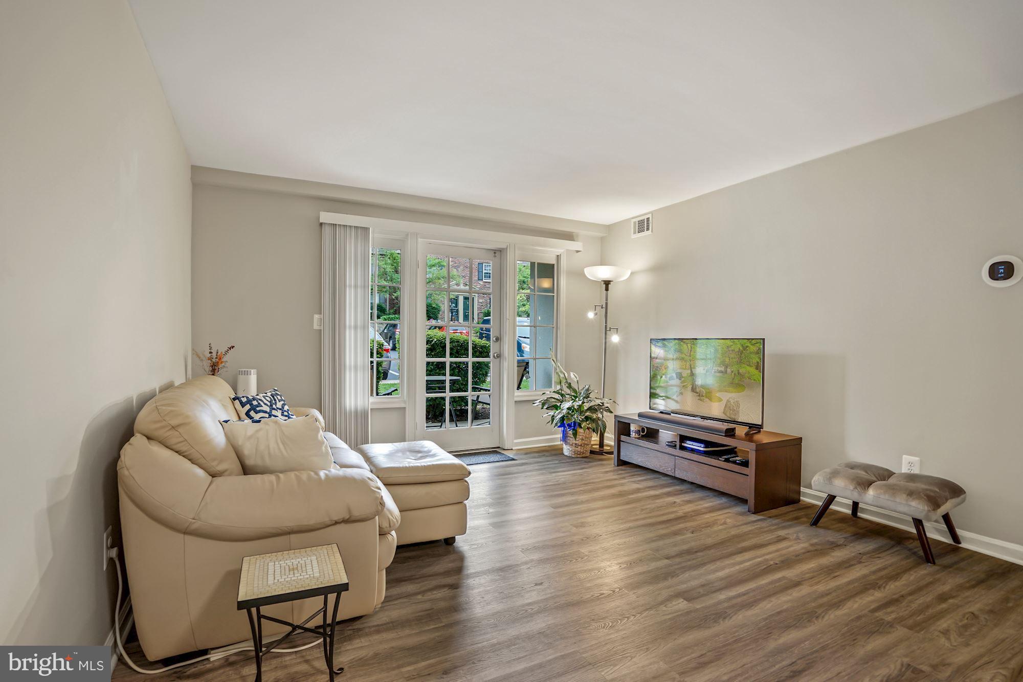 8358 Dunham Court, Unit A Springfield, VA 22152 - Photo 6 of 39 Recently installed Luxury Vinyl Plank Flooring