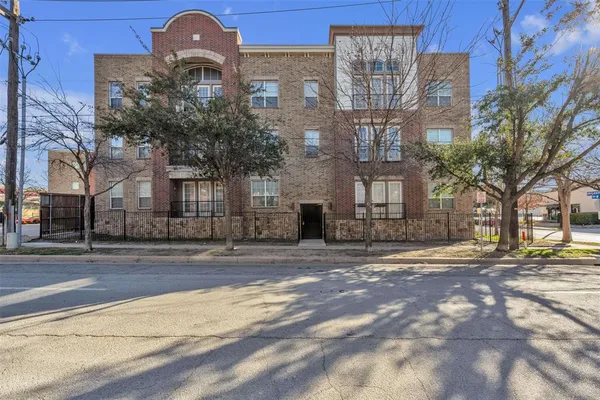 a view of a building with a street