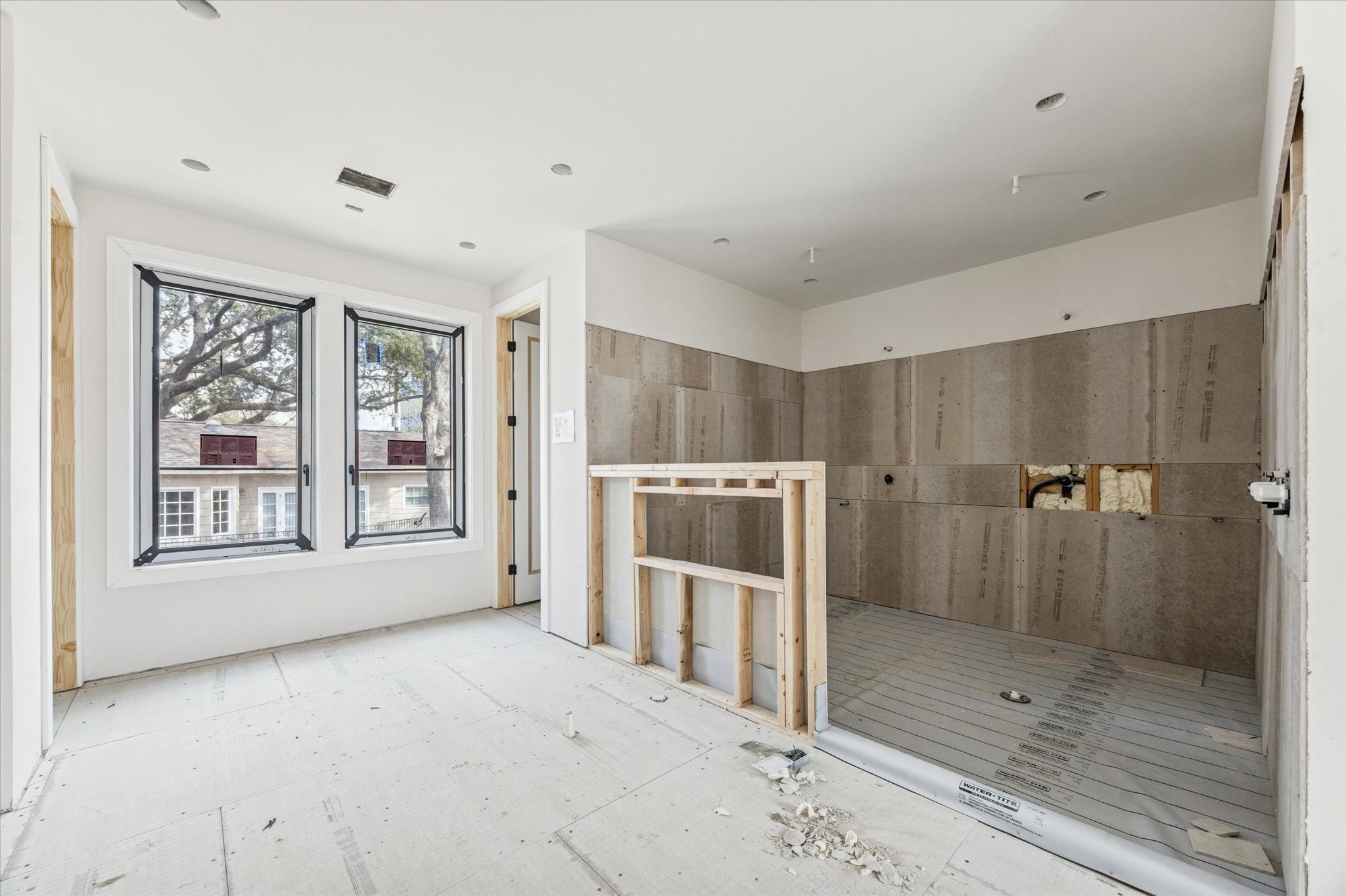2247 Chilton Road Houston, TX 77019 - Photo 11 of 17 2/19/26 Primary bath with wet room with freestanding tub and large double shower.