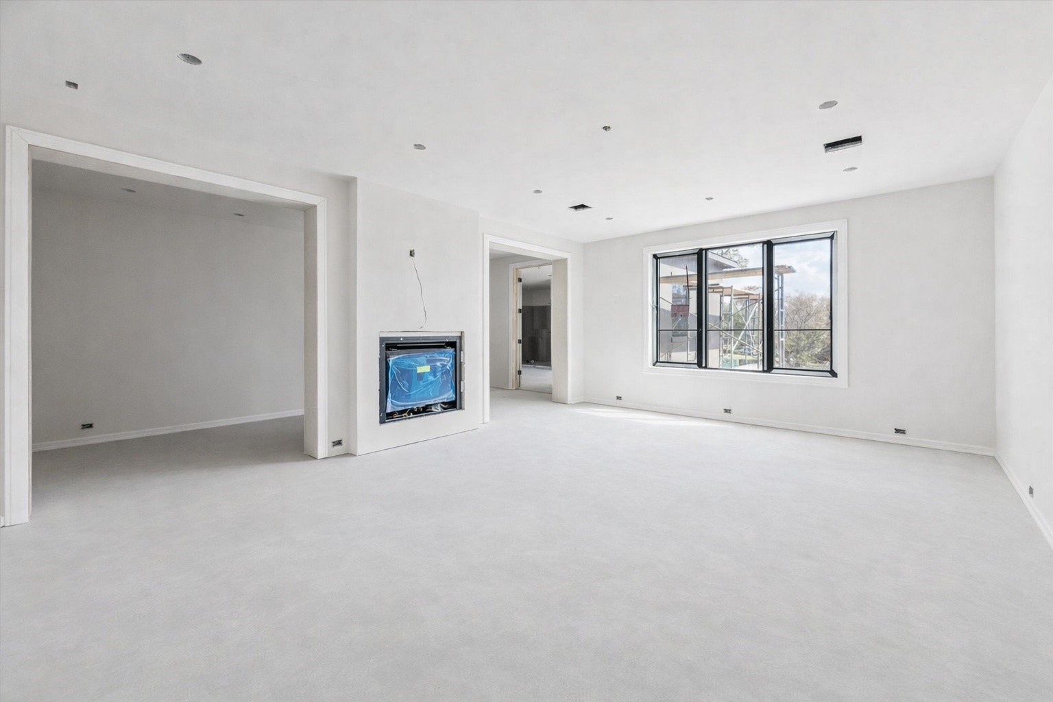 2247 Chilton Road Houston, TX 77019 - Photo 13 of 16 2/19/26 Primary bedroom with fireplace and separate sitting area.