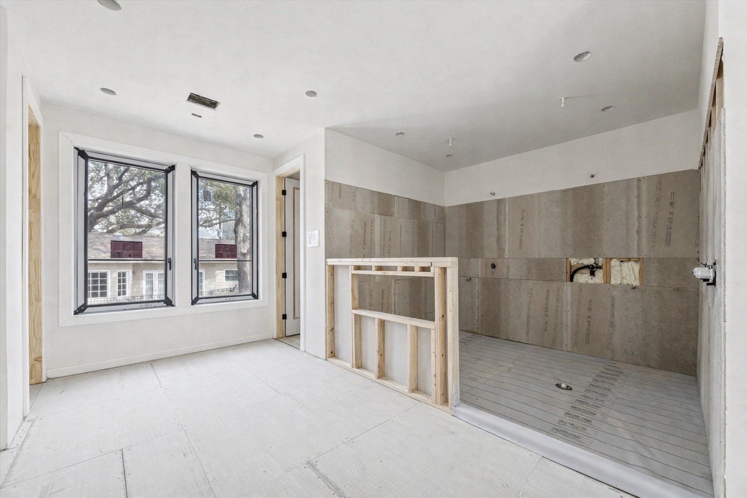 2247 Chilton Road Houston, TX 77019 - Photo 14 of 16 2/19/26 Primary bath with wet room with freestanding tub and large double shower.