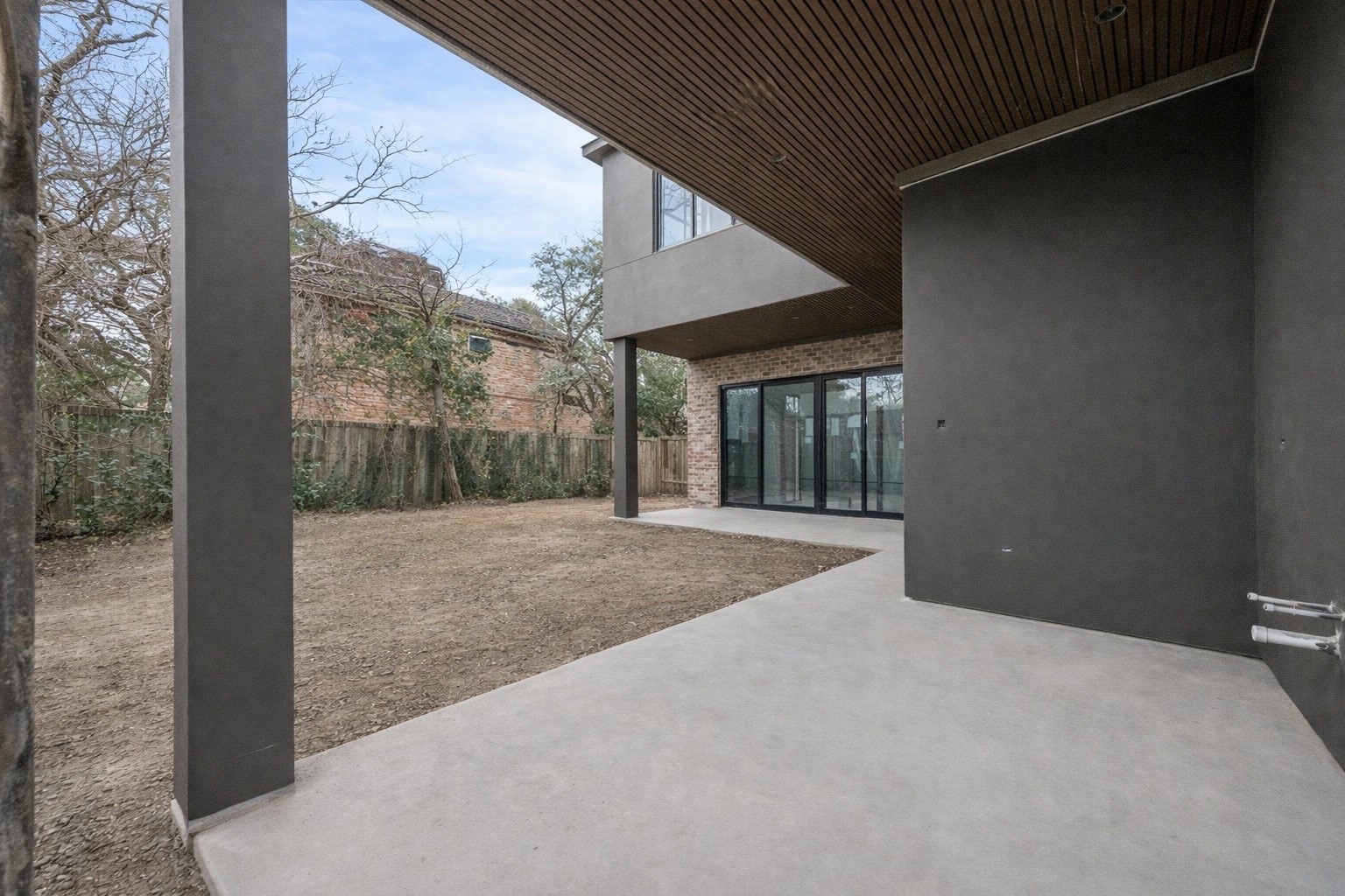 2247 Chilton Road Houston, TX 77019 - Photo 16 of 16 2/19/26 View of backyard form summer kitchen area
