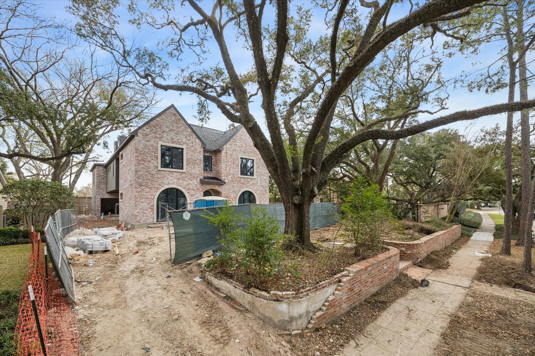 2247 Chilton Road Houston, TX 77019 - Photo 17 of 17 2/19/26 Front yard with brick wall
