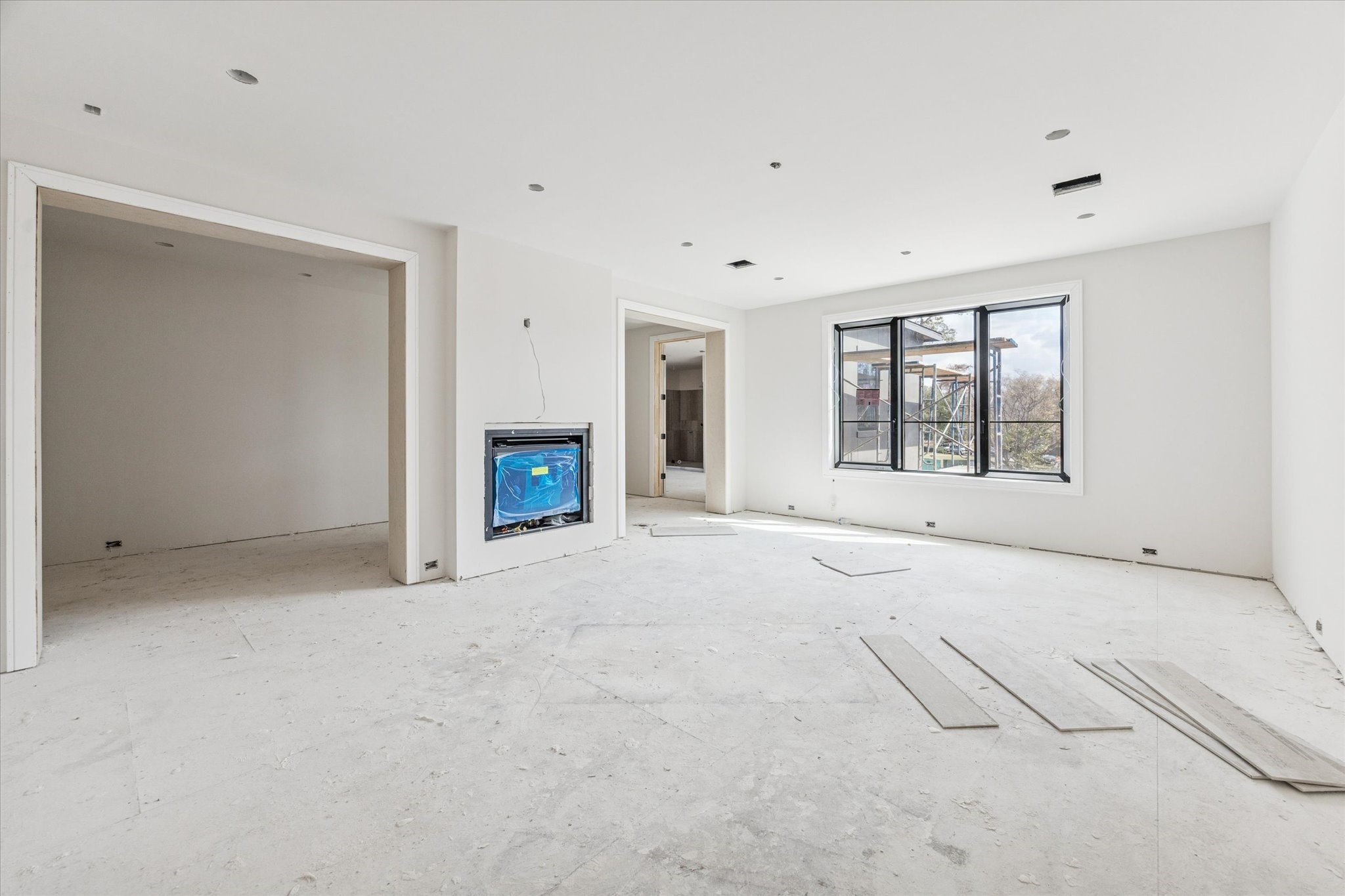 2247 Chilton Road Houston, TX 77019 - Photo 9 of 17 2/19/26 Primary bedroom with fireplace and separate sitting area.