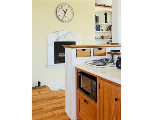 40 Royall Road East Boothbay, ME 04544 - Photo 9 of 25 Kitchen. Marble framed fireplace...