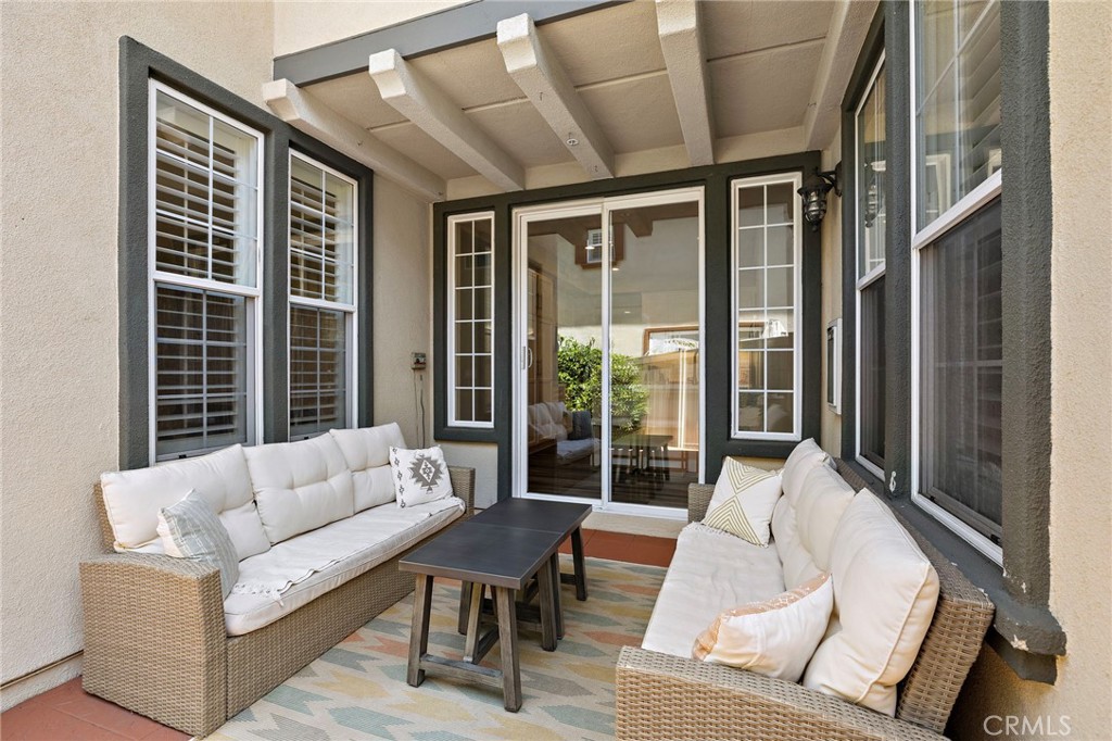 71 Sklar Street Ladera Ranch, CA 92694 - Photo 5 of 55 a living room with furniture and a large window