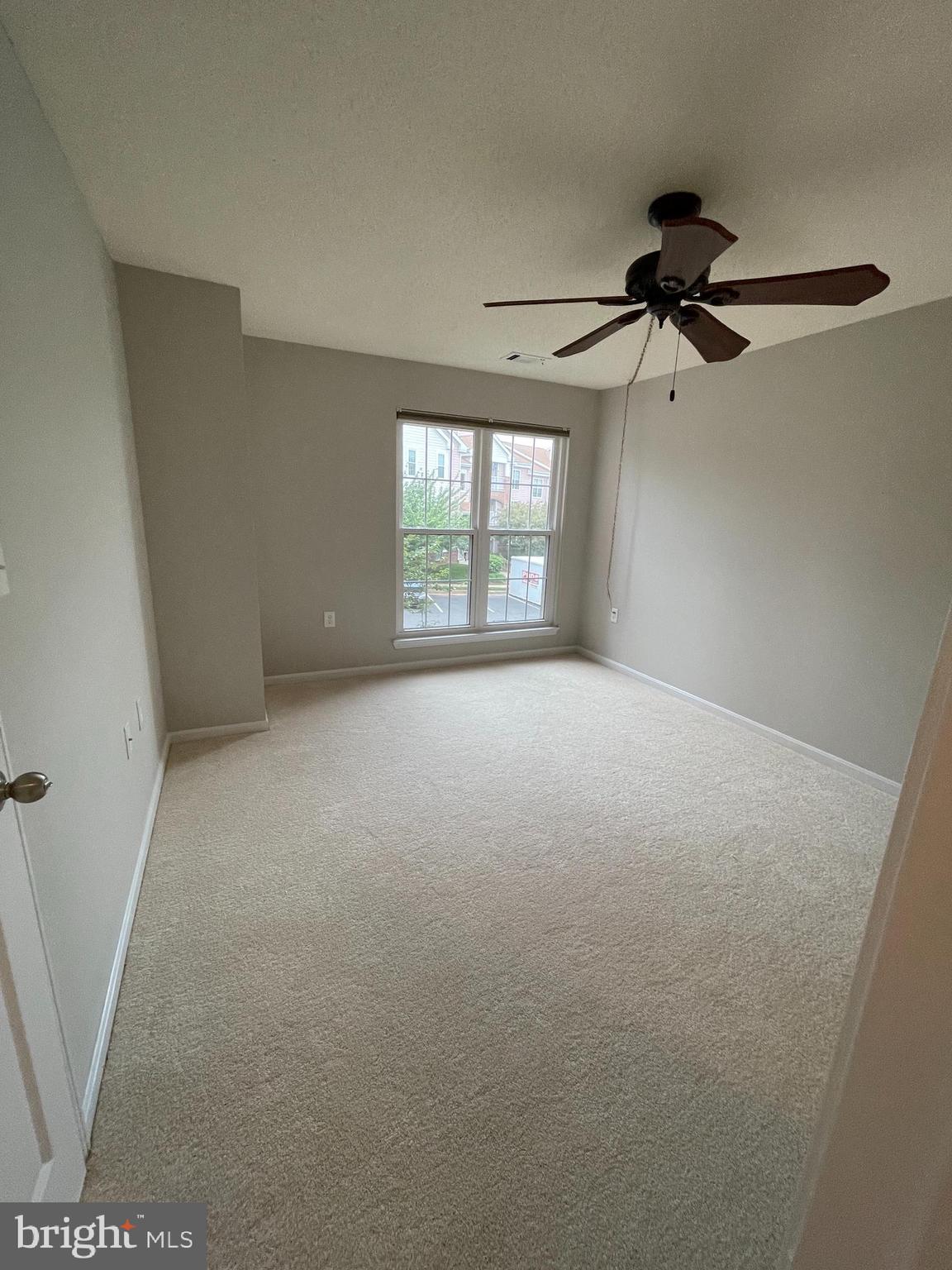 21023 Timber Ridge Terrace, Unit 204 Ashburn, VA 20147 - Photo 22 of 37 Bedroom #2 w/ ceiling fan