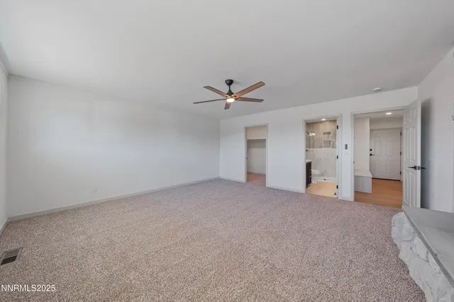 a bathroom with a sink tub and a mirror