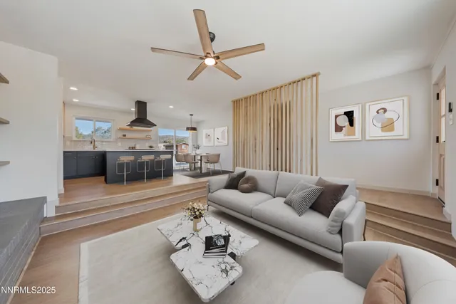 a kitchen with a sink a stove and cabinets