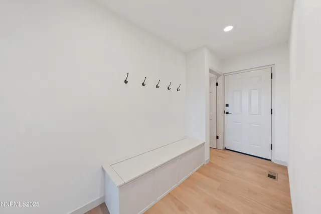 a view of a house with a snow in the yard
