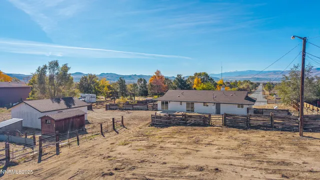 a house with trees in the background