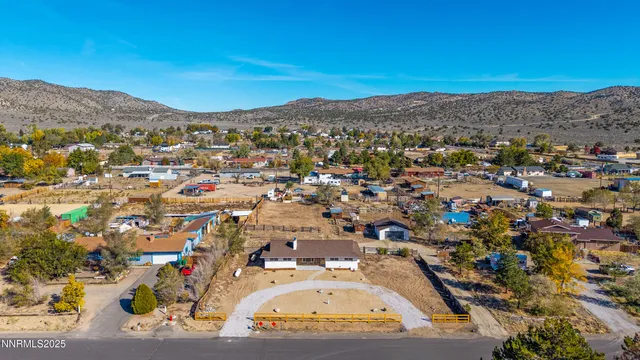 a view of large house with a yard