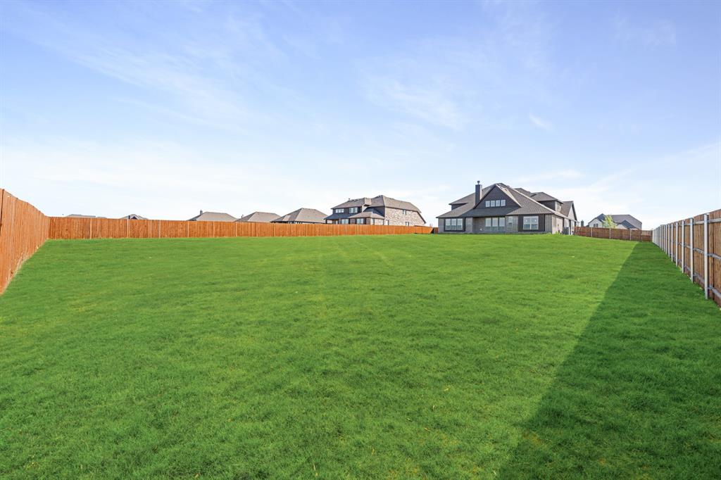 12605 Rocky Top Road Godley, TX 76044 - Photo 39 of 40 a view of a house with a yard