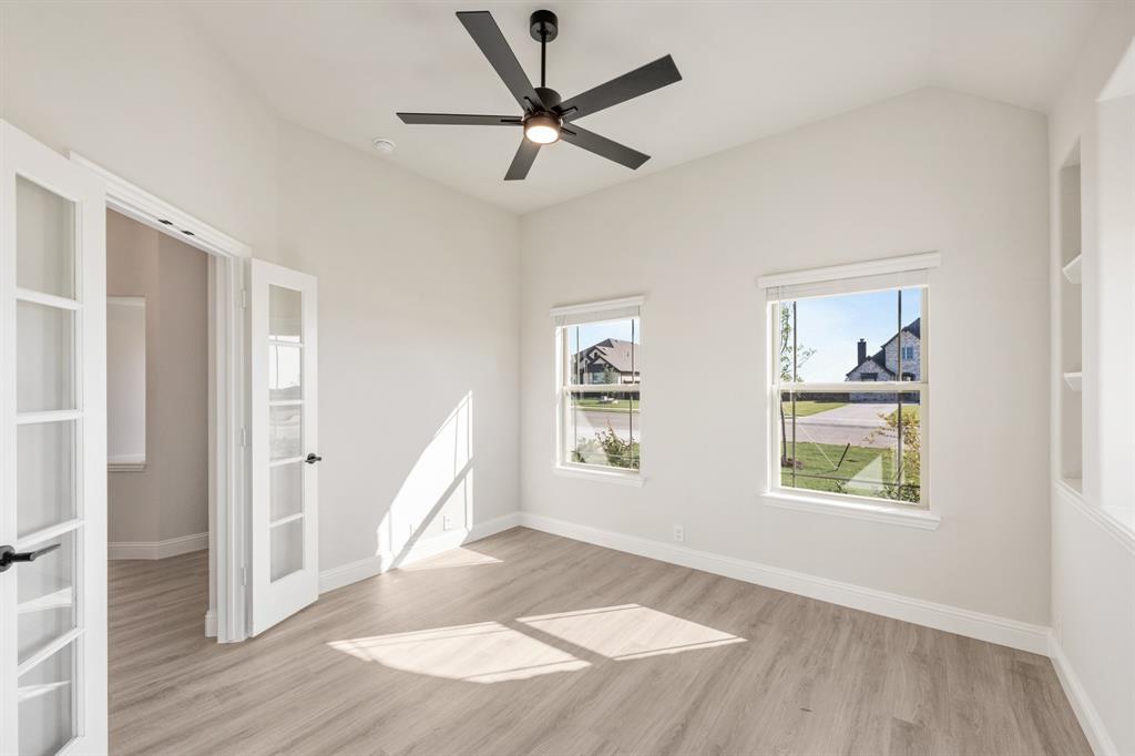 12605 Rocky Top Road Godley, TX 76044 - Photo 6 of 40 wooden floor in an empty room with a window
