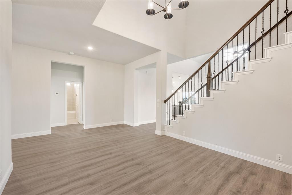 12605 Rocky Top Road Godley, TX 76044 - Photo 9 of 40 a view of an entryway with wooden floor
