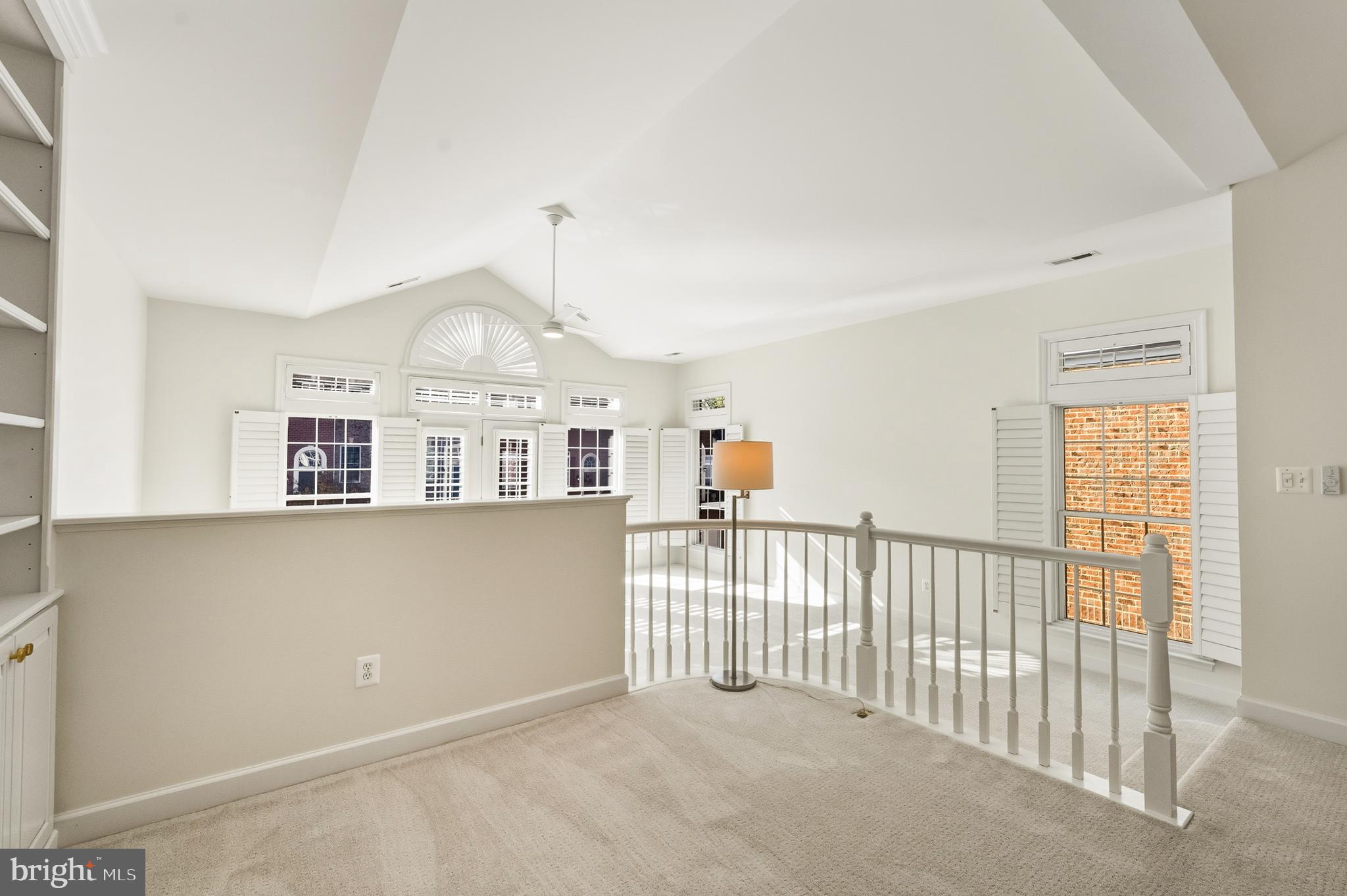1919 Logan Manor Drive Reston, VA 20190 - Photo 20 of 57 a view of livingroom with furniture and windows