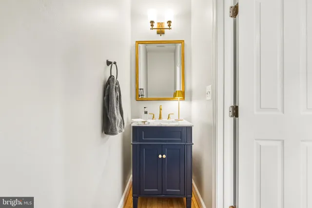 an empty room with a ceiling fan