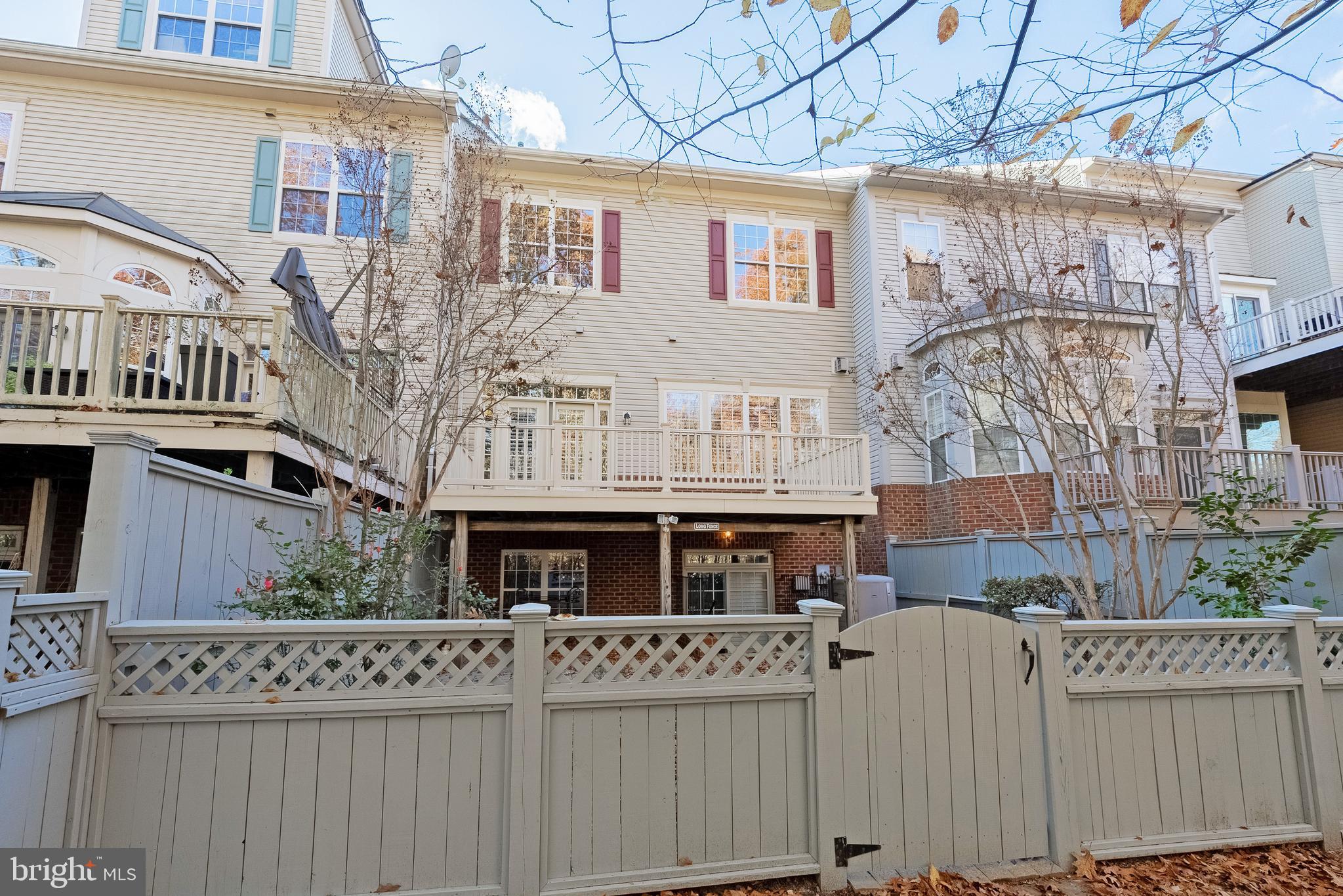 1919 Logan Manor Drive Reston, VA 20190 - Photo 39 of 57 a front view of a building with large windows