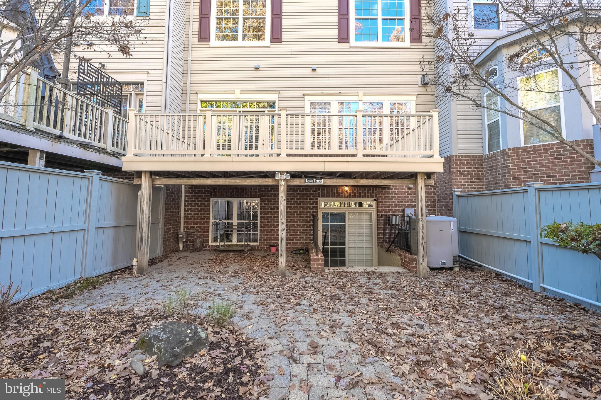 1919 Logan Manor Drive Reston, VA 20190 - Photo 41 of 57 a front view of a house with a garden
