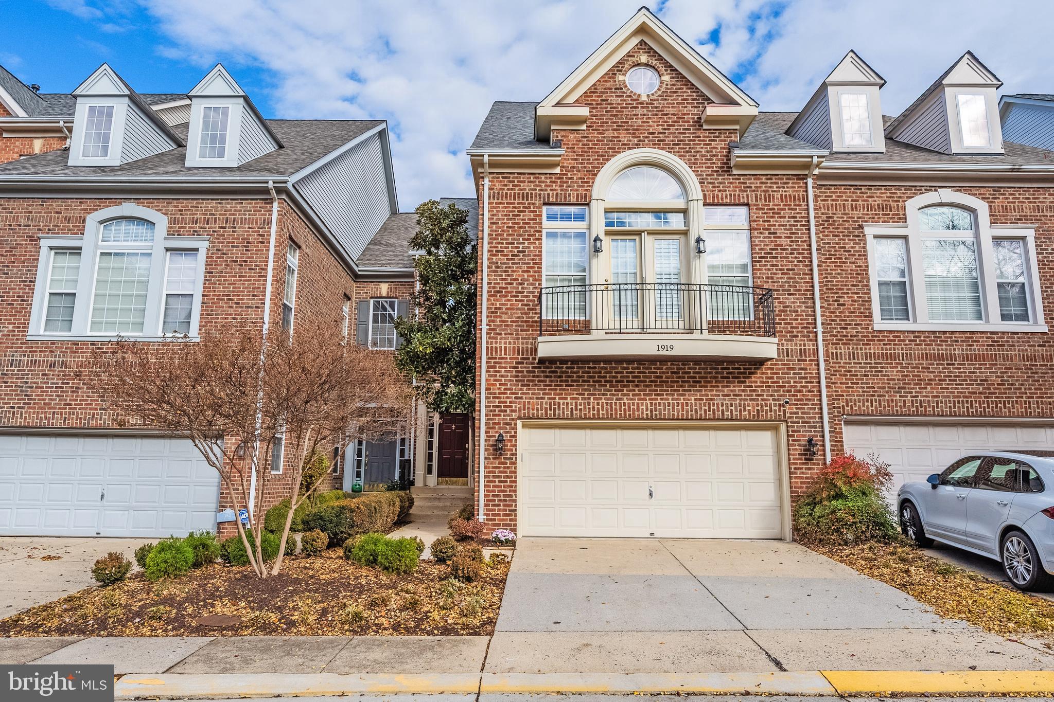 1919 Logan Manor Drive Reston, VA 20190 - Photo 46 of 57 a front view of a house with garden