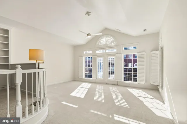 a view of a livingroom with a balcony