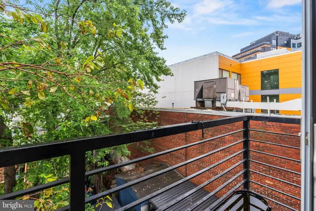 a view of balcony with a flat screen tv