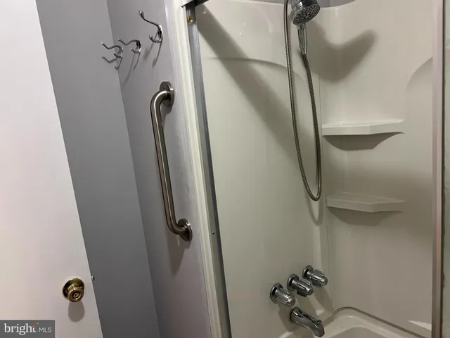 a view of yard with swimming pool and sitting area