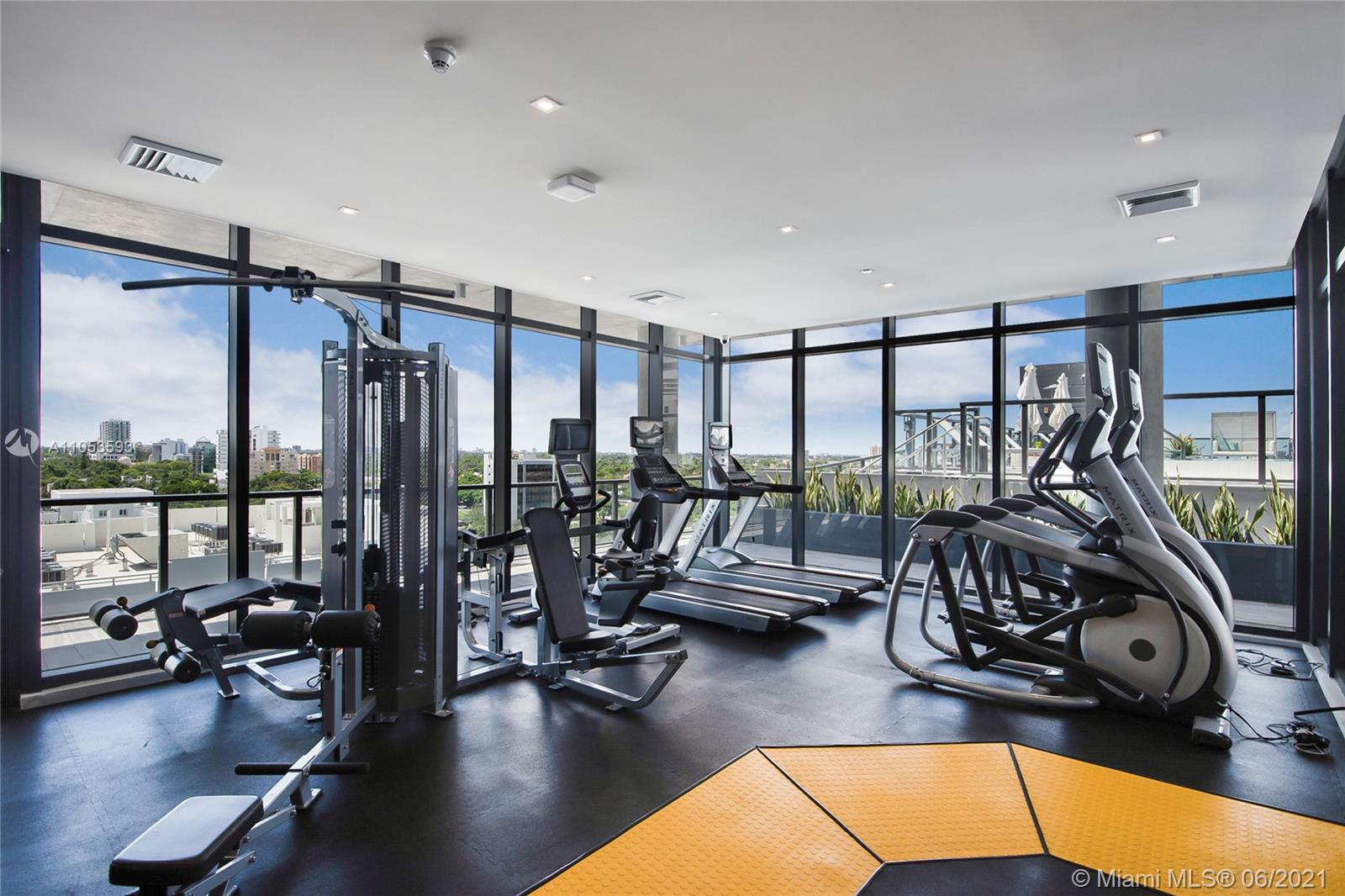 201 Southwest 17th Road, Unit 511 Miami, FL 33129 - Photo 15 of 16 a view of a room with gym equipment