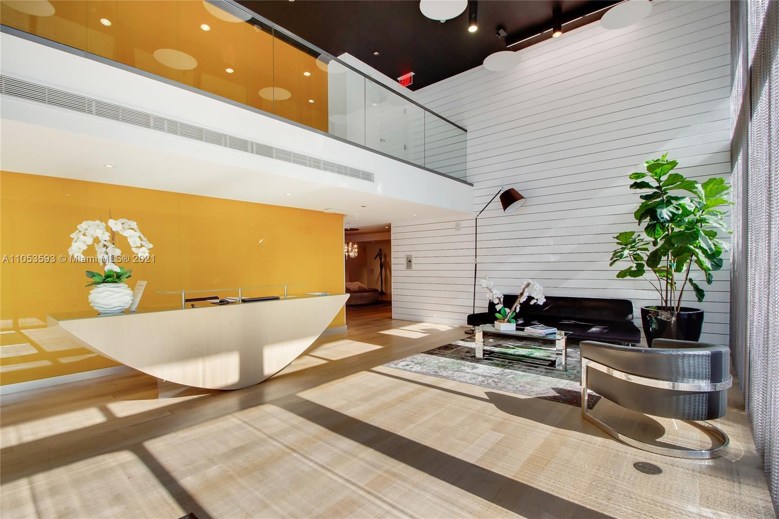 201 Southwest 17th Road, Unit 511 Miami, FL 33129 - Photo 2 of 16 a building outdoor space with patio furniture and potted plants