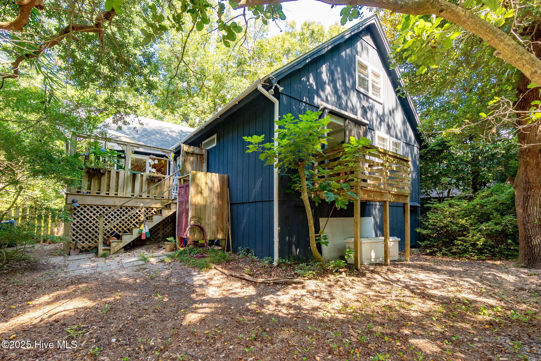 138 Yaupon Road Pine Knoll Shores, NC 28512 - Photo 32 of 68 Rear view of house