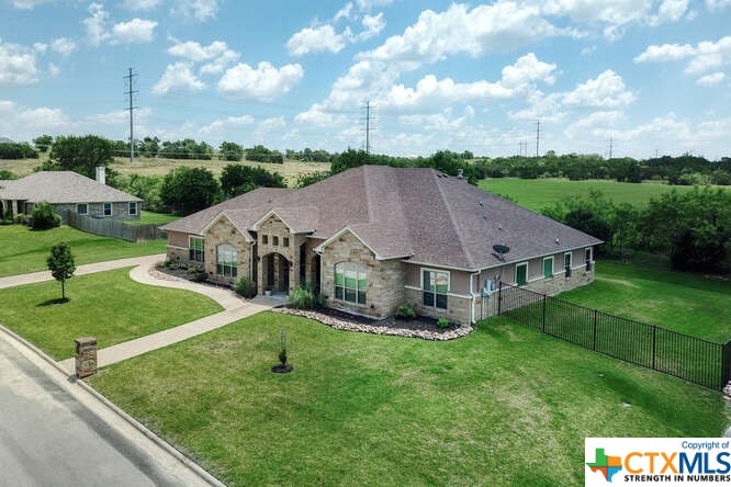 a aerial view of a house with garden
