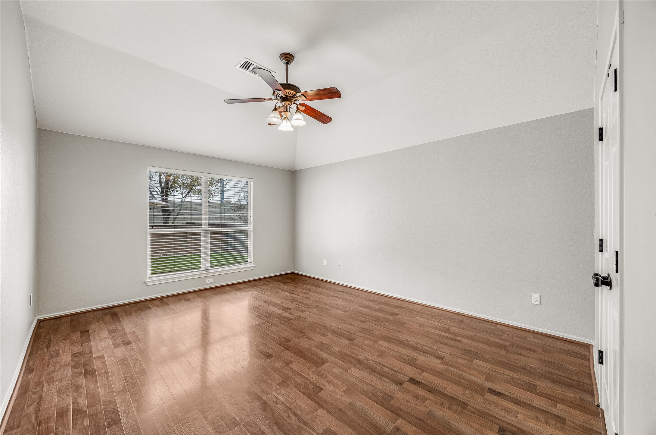 4319 South Summercrest Loop Round Rock, TX 78681 - Photo 24 of 35 a view of empty room with wooden floor and fan
