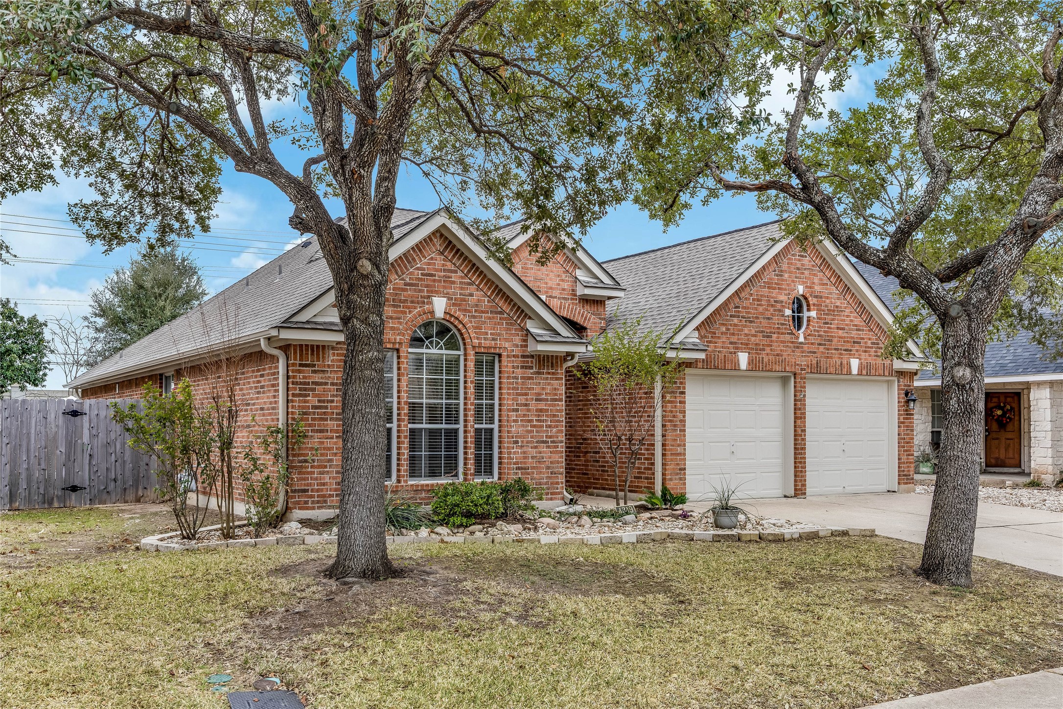 4319 South Summercrest Loop Round Rock, TX 78681 - Photo 33 of 35 a front view of a house with a yard and garage